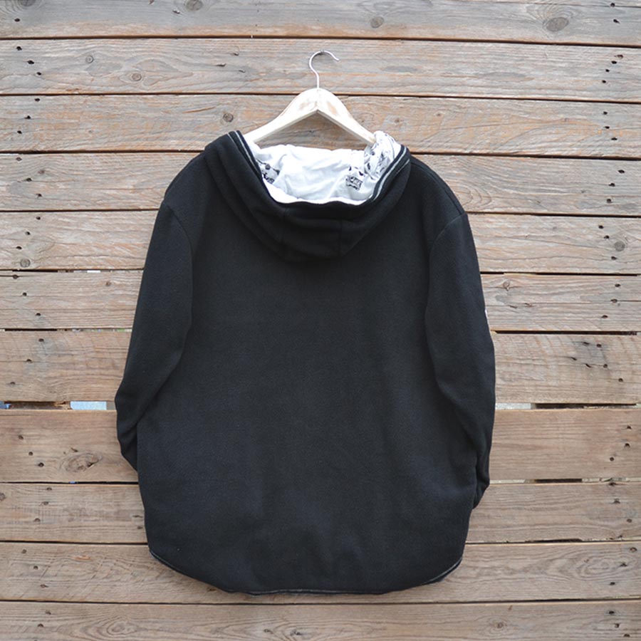 Back Men's reversible hoody, size large in black/natural