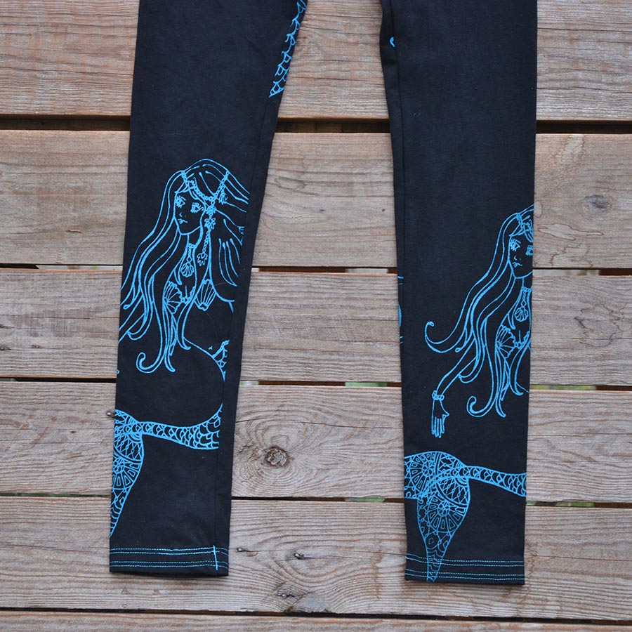 Black/Teal Printed leggings in black with mermaids in teal