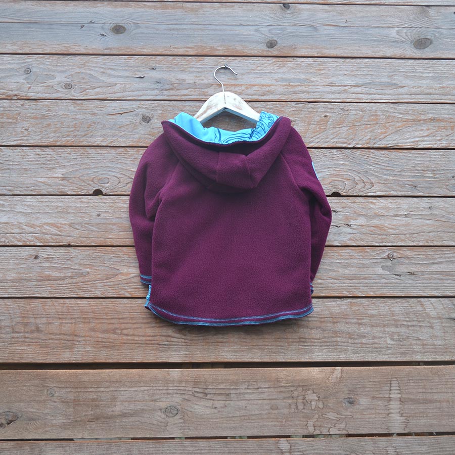 Fleece back Kid's reversible in plum/turquoise